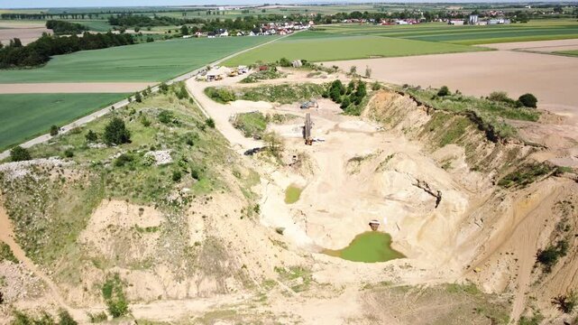 Excavation Work Taking Place in an Old Sand Mine Close to the Town of Prudnik, Poland - Aerial Drone Shot