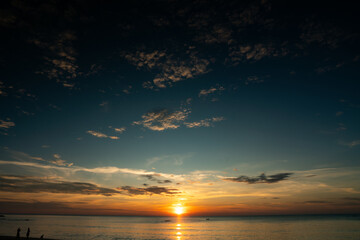 colorful dramatic sky with cloud at sunset.