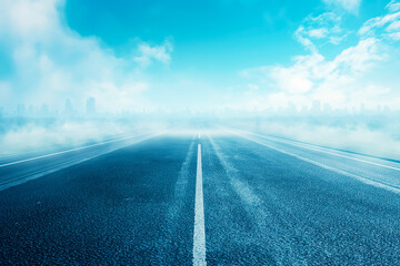 An empty road leading towards a city skyline enveloped in mist, under a clear, blue sky, concept of journey. Generative AI