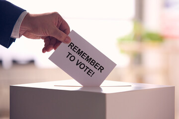 Person Casting Ballot in Election