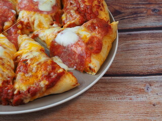 home made deep pan salami pizza 