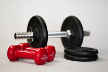 Naklejka premium Dumbbells for sports are on a white background