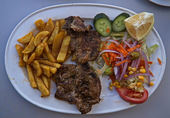 Grilled pork chops with pommes frites on Gran Canaria,Canary Islands,Spain,Europe
