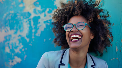 Confident and successful businesswoman laughing outdoors
