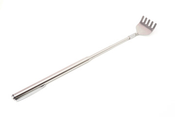 Portable stainless steel back scratcher can be extended and retracted isolated on white background.