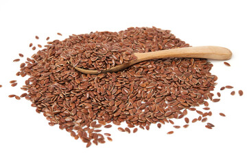 Brown flax seeds on spoon and scattered isolated on white background. Brown Flax Seed is rich in nutrients such as dietary fiber and essential fatty acids that are beneficial to the body.
