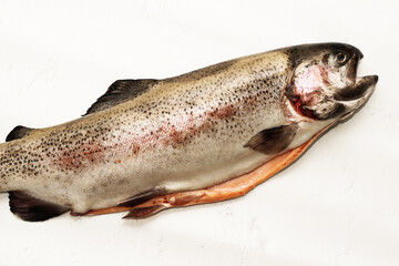 Fish red river trout, cleaning the scales, home cooking