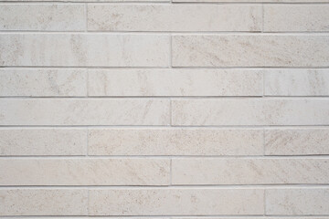 Une matière de pierre blanche en forme de brique