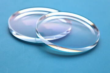Glasses lens on blue 