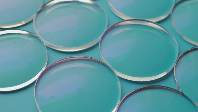 Eyeglasses lens production industry, close-up eyeglasses lenses, eyeglasses lenses, eyeglasses lenses, eyeglasses store business concept
