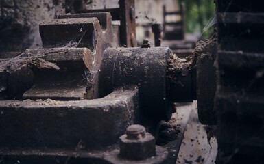 Rusty old locked gear Transmission in mill