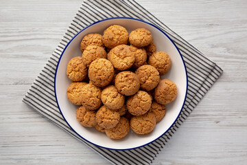 Homemade Sweet and Crunchy Amaretti on a Plate, top view. Flat lay, overhead, from above.