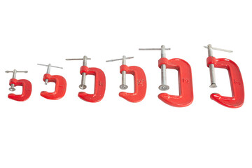 Six red G-Clamps of different sizes isolated on a white background. Woodworking tools sorted...