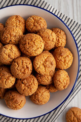 Homemade Sweet and Crunchy Amaretti on a Plate, top view. Flat lay, overhead, from above. Close-up.