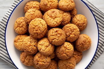 Homemade Sweet and Crunchy Amaretti on a Plate, top view. Flat lay, overhead, from above. Close-up.