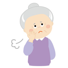 ため息をついている高齢の女性