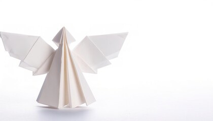 religion, spiritual, God, Jesus concept paper origami isolated on white background of an Angel with wings. simple starter craft for kids for weekend arts and crafts entertainment