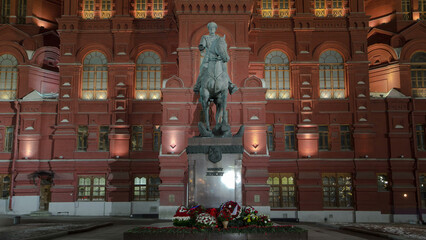 The monument to Marshal Zhukov near the Historical Museum at night timelapse hyperlapse. Moscow, Russia