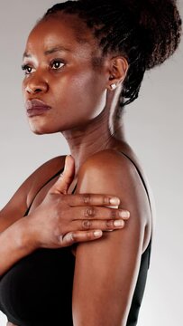 Close-up of African American Woman Applying Contraceptive Nicotine Patch for Smoking Cessation Therapy
