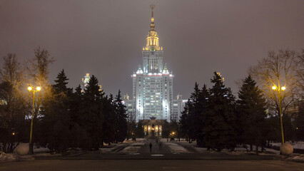 Obraz premium The Main Building Of Moscow State University On Sparrow Hills At Winter timelapse at Night