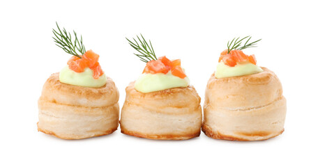 Delicious puff pastry with avocado cream, salmon and dill isolated on white