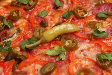 Delicious hot pizza Diablo as background, closeup