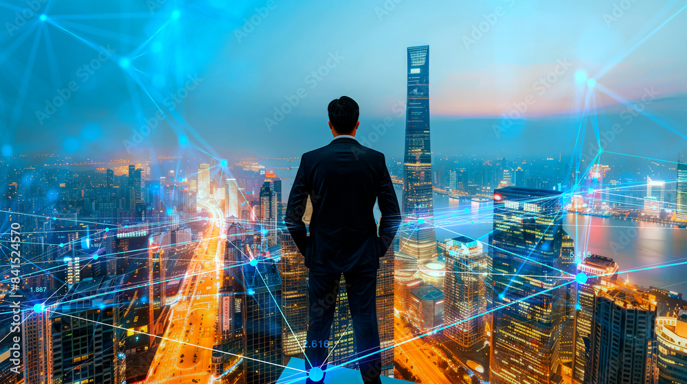 Poster a businessman overlooking a cityscape overlaid with digital network graphics, concept of business te