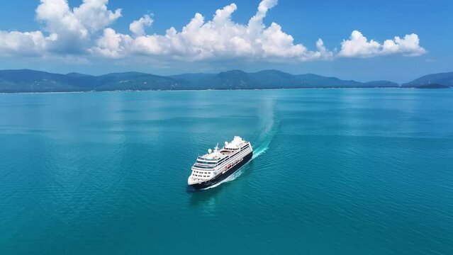 Cruise ship sailing across The Mediterranean sea - Aerial footage. Luxury cruise in the ocean sea concept tourism travel on holiday take a vacation time on summer. 