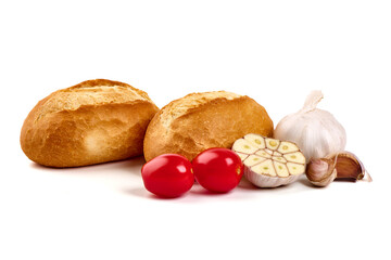 Freshly baked crispy bread rolls, close-up, isolated on a white background.