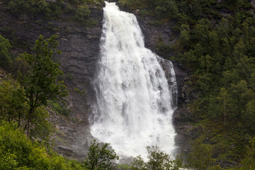 Obraz premium Norway Steinsdalsfossen waterfall on a sunny summer day