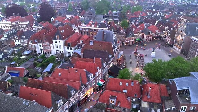 Beautiful Historic Buildings in Old Medieval Town of Hoorn, The Netherlands, Aerial Drone View in Evening.