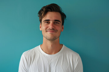 Fototapeta premium A close up portrait of a young man with a subtle smile