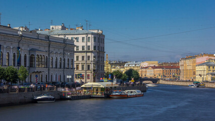 Fototapeta premium Embankment of Fontanka River timelapse hyperlapse, view from the Anichkov bridge, Saint-Petersburg, Russia