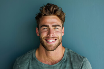 Fototapeta premium A close up portrait of a young man with a subtle smile