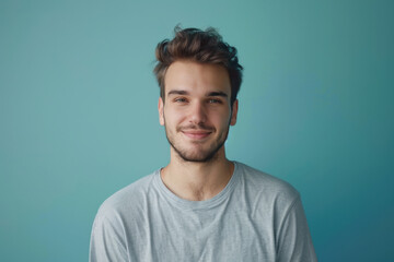 Fototapeta premium A close up portrait of a young man with a subtle smile