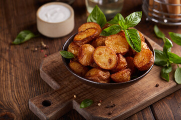 Baked potatoes. Potatoes with skin baked with olive oil and seasoning to golden color. Delicious...