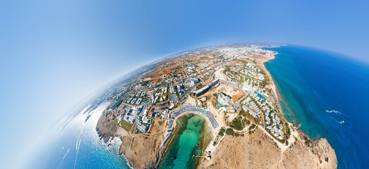 Fototapeta premium Coastal city of Ayia Napa encircled by the deep blue sea. Cyprus