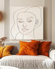 Modern living room with abstract female face line art, orange pillows, and neutral tones creating a cozy and stylish interior design.