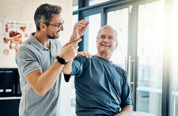 Physiotherapy, consulting and senior man with arm pain for rehabilitation, physical therapy and exercise. Healthcare, chiropractor and therapist with patient for medical service, wellness and support