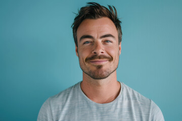 Obraz premium A close up portrait of a young man with a subtle smile