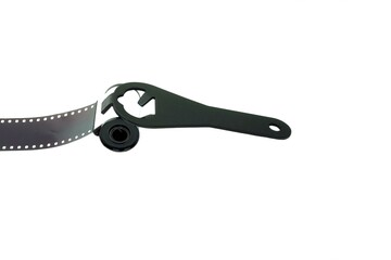 Top-down veiw to preparing  to open film  canister  to preparing for develope processing.