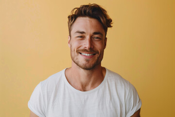 Obraz premium A close up portrait of a young man with a subtle smile