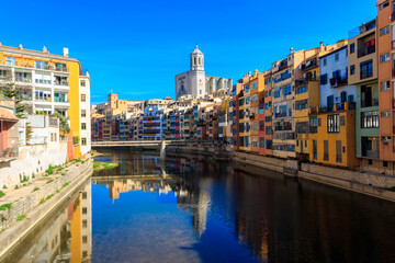 Colorful houses on the bank of the Onyar river in the old town of Girona, Spain