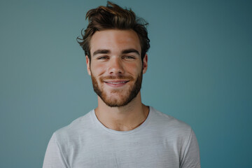 Fototapeta premium A close up portrait of a young man with a subtle smile