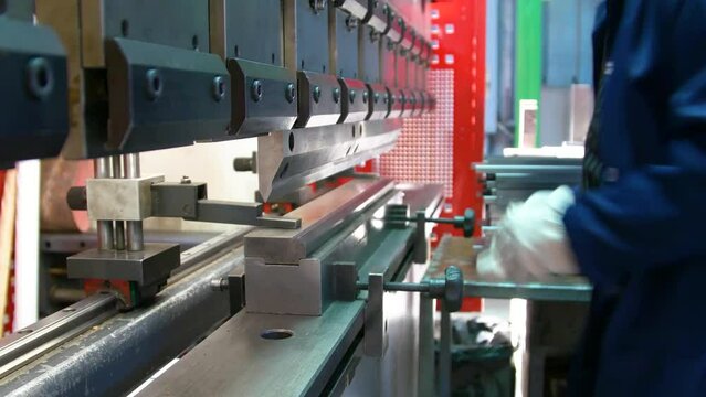 Factory hydraulic press. Stamping of sheet steel parts on a hydraulic press. Stamping on the press. 