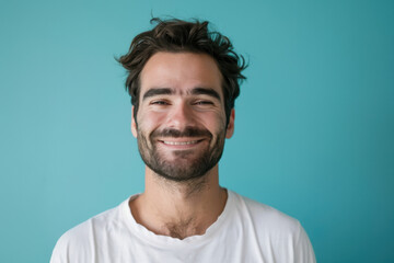 Obraz premium A close up portrait of a young man with a subtle smile