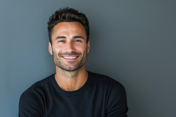 Fototapeta premium A close up portrait of a young man with a subtle smile