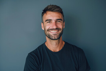 Obraz premium A close up portrait of a young man with a subtle smile