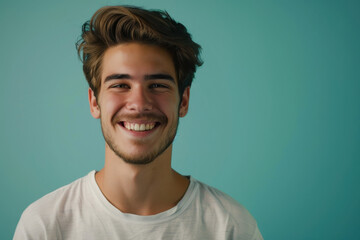 Obraz premium A close up portrait of a young man with a subtle smile