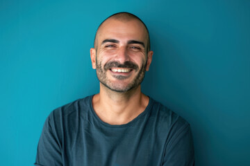 Fototapeta premium A close up portrait of a young man with a subtle smile